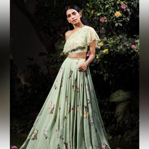 Mahima Mahajan olive one-off shoulder blouse and lehenga set.